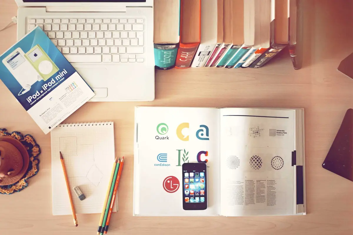 Demo photo: sketches and notebooks on a desk